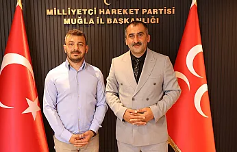 MHP Fethiye İlçe Başkanlığı'nda görev değişimi: Hüseyin Mukyen'in yerine Tuğrul Öztürkçü atandı