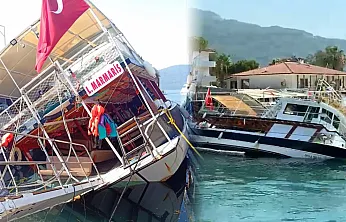 Muğla Akyaka'da tur teknesi su alarak yan yattı