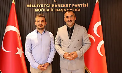 MHP Fethiye İlçe Başkanlığı'nda görev değişimi: Hüseyin Mukyen'in yerine Tuğrul Öztürkçü atandı