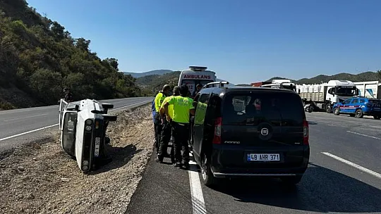 Yan yatan otomobilden yara almadan kurtuldular