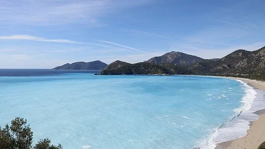 Denizin rengini gören bir daha baktı