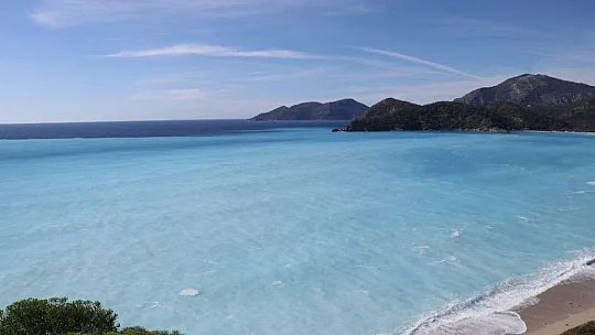 Denizin rengini gören bir daha baktı