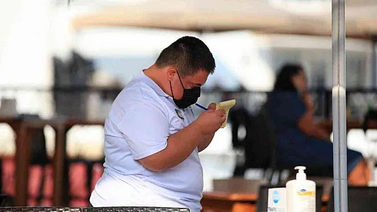 Down sendromlu Yiğit, çalışma azmiyle herkese örnek oluyor