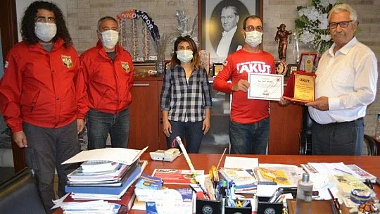 Fethiye AKUT Ekibi'nden Başoğlu'na teşekkür plaketi