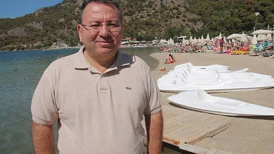 FETHİYE'DE TURİSTLER DENİZE KOŞUYOR