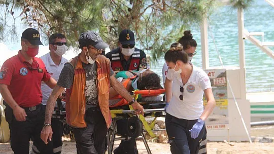 KAYALARDAN DENİZE DÜŞEN TATİLCİ HASTANEYE YETİŞTİRİLDİ