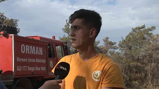 Marmaris'te alev nöbeti tutan orman işçisi: Marmaris'te alev nöbeti tutan orman işçisi: 'Her yer güvenli denilene kadar bu bölgedeyiz'
