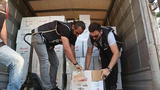 Ölüdeniz'de Kamyon kasasında 8 bin şişe kaçak içki ele geçirildi