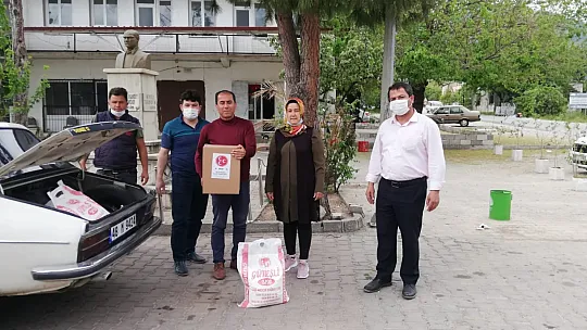 MHP Seydikemer ihtiyaç sahiplerine gıda kolileri ulaştırdı