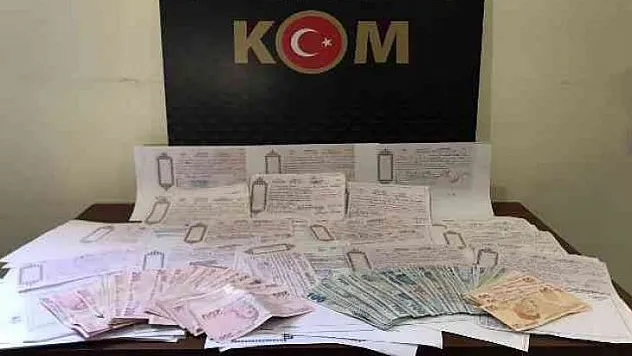 65 adet senet ve 26 bin TL parayla yakalandı