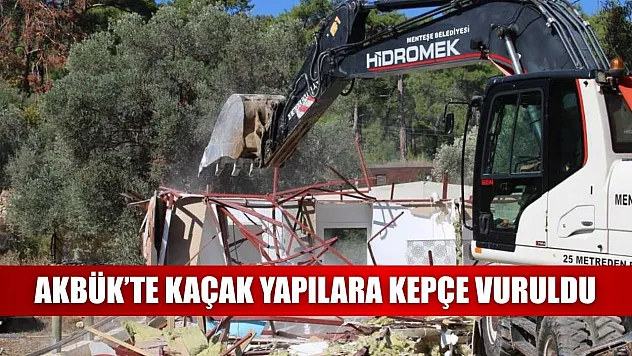 Akbük'te kaçak yapılara kepçe vuruldu