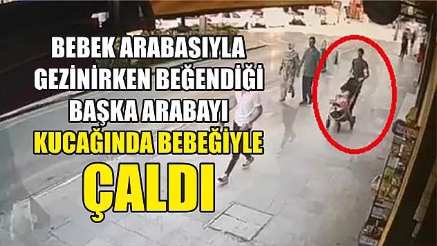 Bebek arabasıyla gezinirken beğendiği başka arabayı kucağında bebeğiyle çaldı