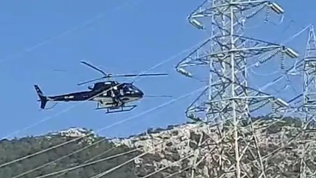 Bodrum'da yüksek gerilim hatları helikopterle temizlendi