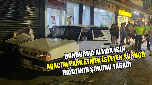 Dondurma almak için aracını park etmek isteyen sürücü, hayatının şokunu yaşadı