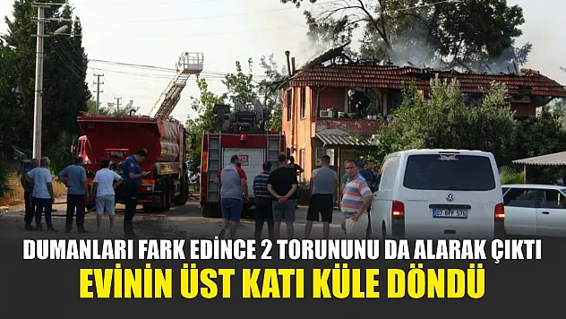 Dumanları fark edince 2 torununu da alarak çıktı, evinin üst katı küle döndü