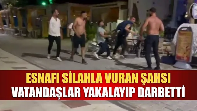 Esnafı silahla vuran şahsı, vatandaşlar yakalayıp darbetti