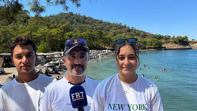 Fethiye Büyük Samanlı Koyu'nda yoğun sezon: Öğrenciler turizmi sahada öğreniyor