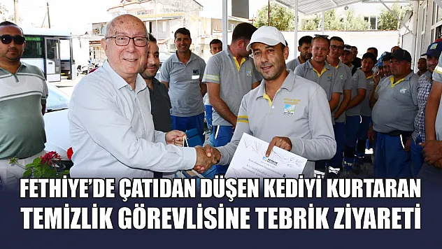 Fethiye'de çatıdan düşen kediyi kurtaran temizlik görevlisine tebrik ziyareti