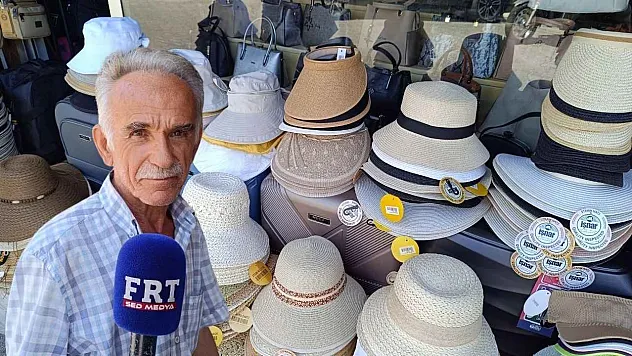 Fethiye'de Yaz Sıcağı Şapka Satışlarını Hareketlendirdi: Esnaf Güneşe Karşı Uyardı