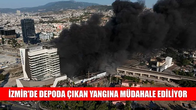 İzmir'de depoda çıkan yangına müdahale ediliyor