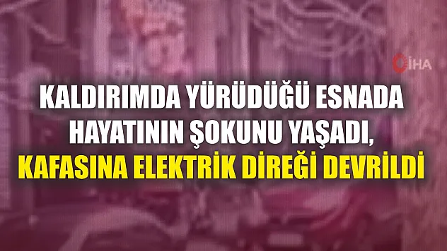 Kaldırımda yürüdüğü esnada hayatının şokunu yaşadı, kafasına elektrik direği devrildi