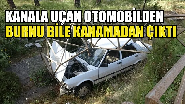Kanala uçan otomobilden burnu bile kanamadan çıktı