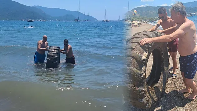 Marmaris Halk Plajı'nda denizden çıkan dev lastik şaşırttı
