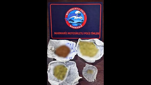Marmaris'te kavga ihbarına giden polis torbalarca uyuşturucu yakaladı