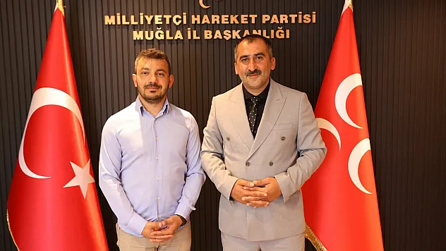 MHP Fethiye İlçe Başkanlığı'nda görev değişimi: Hüseyin Mukyen'in yerine Tuğrul Öztürkçü atandı