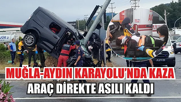 Muğla-Aydın Karayolu'nda kaza: Araç direkte asılı kaldı