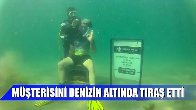 Müşterisini denizin altında tıraş etti