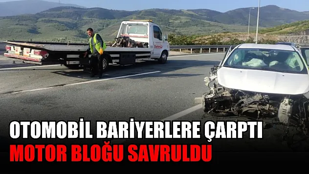 Otomobil bariyerlere çarptı motor bloğu savruldu
