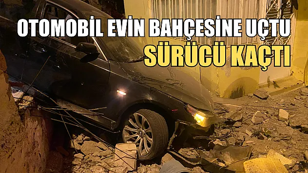 Otomobil evin bahçesine uçtu, sürücü kaçtı