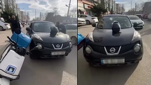 Otomobil sürücüsü ile motosikletli kurye arasındaki gerginlik kamerada