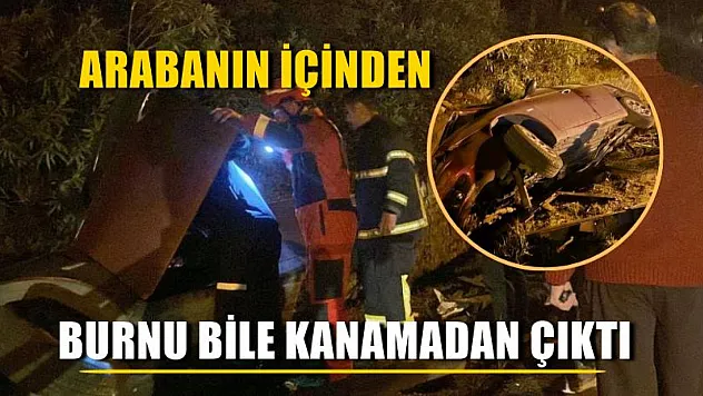 Refüje düşen arabanın içinden burnu bile kanamadan çıktı