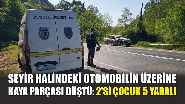 Seyir halindeki otomobilin üzerine kaya parçası düştü: 2'si çocuk 5 yaralı