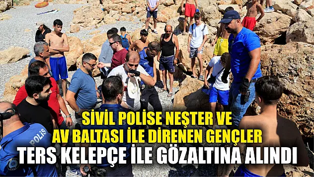 Sivil polise neşter ve av baltası ile direnen gençler, ters kelepçe ile gözaltına alındı