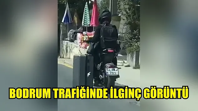 Valizi motosiklete alamayınca çareyi böyle buldu