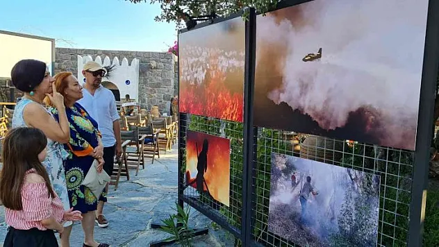 Yangınlarda çektiği fotoğraflardan sergi açtı