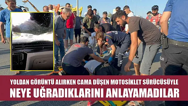 Yoldan görüntü alırken cama düşen motosiklet sürücüsüyle neye uğradıklarını anlayamadılar