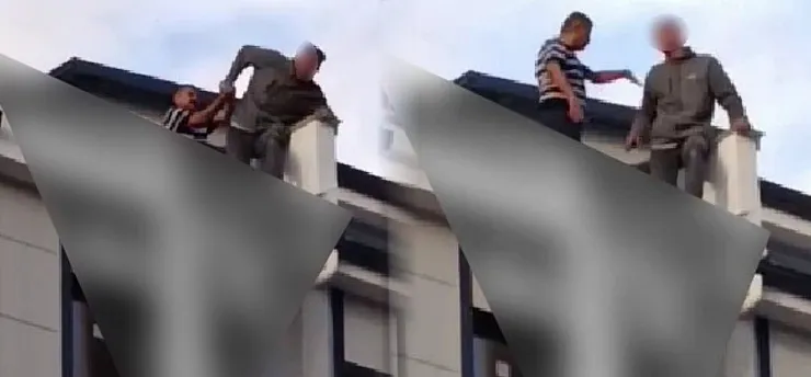 Eşiyle tartışıp çatıya çıkan genci Başkan son anda çekip aldı