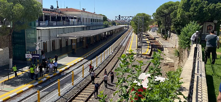 Tren yoluna atlamak isteyen adamı ekipler kurtardı
