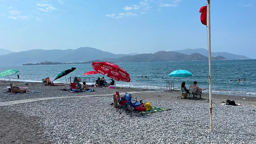 Fethiye'nin bunaltıcı neminde vatandaşın nefes aldığı nokta 'Çalış Plajı'