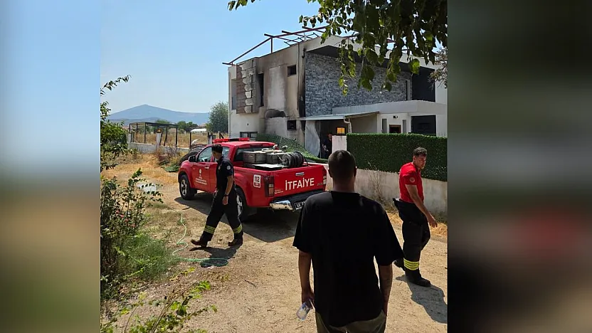 Milas'ta evin yanındaki odunlar alev aldı