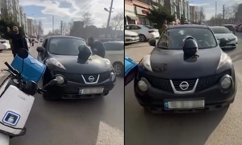 Otomobil sürücüsü ile motosikletli kurye arasındaki gerginlik kamerada